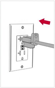 Plugging the cord into the power