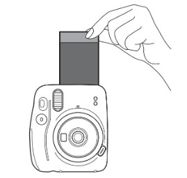 Grasping the edges of the photo