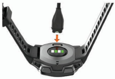 Plugging the watch into the power