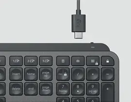Plugging the USB cable into the keyboard